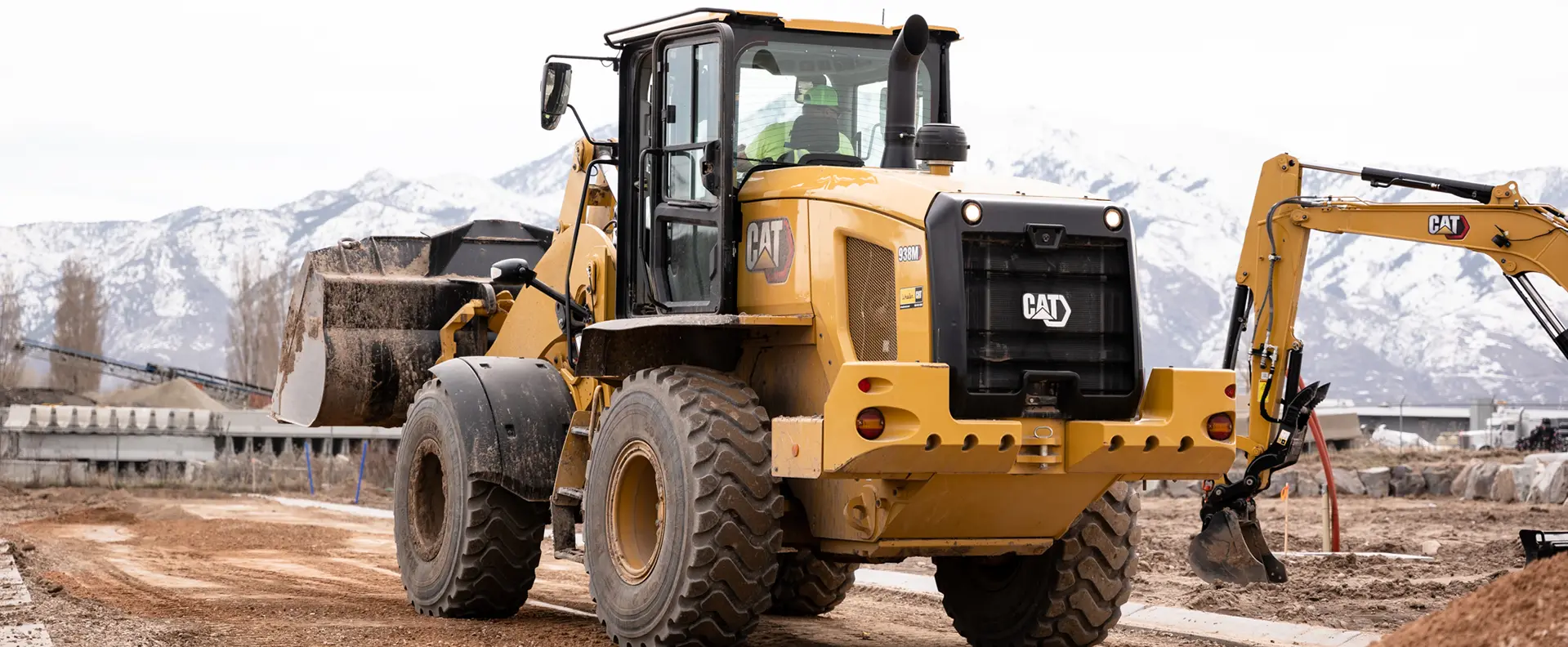 Cat machines working on construction site.